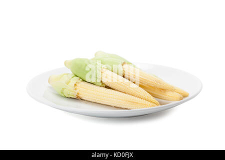 baby corn on white ceramic plate isolated on white background with shadow and clipping path Stock Photo