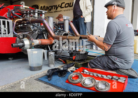 MAGNY-COURS, FRANCE, June 30, 2017 : Mechanic at work. The First French Historic Grand Prix takes place in Magny-Cours with a lot of ancient sports an Stock Photo