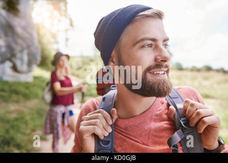 Portrait of man hiking looking away smiling, Krakow, Malopolskie, Poland, Europe Stock Photo