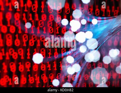 Fibre optics carrying data attacking a laptop computer which has a virus Stock Photo