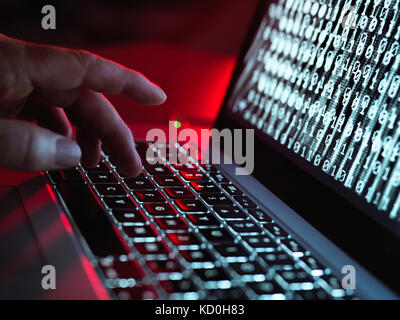 Laptop computer being infected by a virus Stock Photo