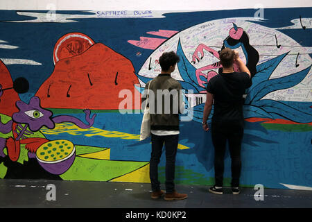 London, UK. 08th Oct, 2017. BBC Music Introducing HOSTS Amplify '17 held this event at the London Excel aimed at up coming musicians, radio hosts, record producers, etc, offering advice, on how to make a living from making music .The Wall was the chance for anybody who whished to leave his/her name and social media details to expand their carrers@Paul Quezada-Neiman/Alamy Live News Credit: Paul Quezada-Neiman/Alamy Live News Stock Photo