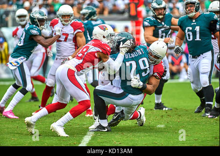 Philadelphia, Pennsylvania, USA. 9th Oct, 2017. Eagles' running back LeGarrette Blount (29) is tackled by Cardinals' cornerback Justin Bethel (28) and defensive lineman Josh Mauro (97) during a NFL game between the Arizona Cardinals and the Philadelphia Eagles at Lincoln Financial Field in Philadelphia, Pennsylvania. Duncan Williams/CSM/Alamy Live News Stock Photo