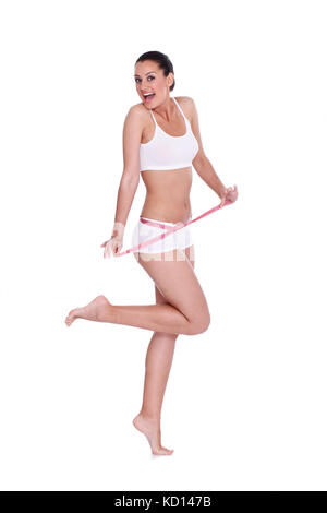 Happiness woman measuring perfect shape, healthy lifestyles concept Stock Photo