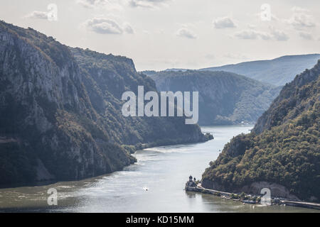 Mraconia Monastery, in Romania, taken from the Serbian part of Danube river in the Iron Gates (Portile din Fier). The monastery, one of the symbols of Stock Photo