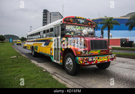 SMUG, CONCEITED, VAIN, SNOOSTY. BUS RED DEVIL DIABLO ROJO PAINTED BUS PANAMA CITY REPUBLIC OF PANAMA Stock Photo