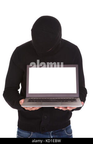 Burglar Showing Blank Laptop Isolated On White Background Stock Photo