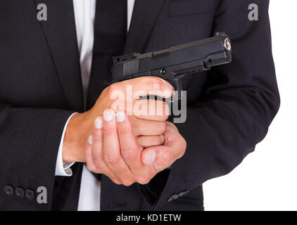 Close-up Of A Male Spy In Suit Holding Handgun Stock Photo