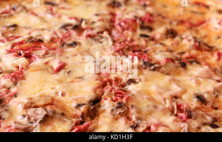 picture of a Fresh baked pizza in macro view Stock Photo