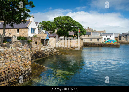 Cottages backing on to the sea at the old jetty, Stromness, Orkney Mainland, Scotland, UK. Stock Photo