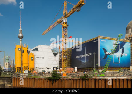 BERLIN, 19th JUNE: Samsung Galaxy S8 huge bill board advertising panel mounted in the "Berliner Schloss", building under construction near Alexanderpl Stock Photo