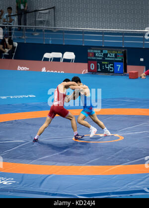 Baku, Azerbaijan - May 18, 2017 : Men's Greco Roman Wrestling 66kg final at 4th Islamic Solidarity Games Stock Photo