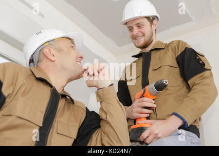 two builders talking Stock Photo