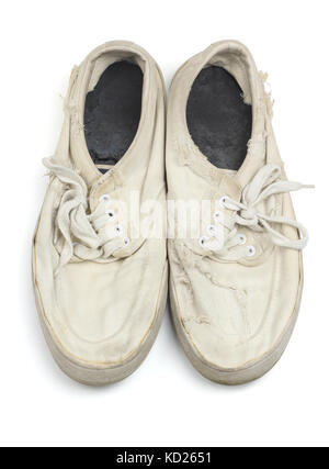 Pair of Worn Canvas Shoes on White Background Stock Photo
