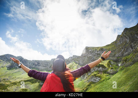 Toned photo of tourist girl with backpack Stock Photo