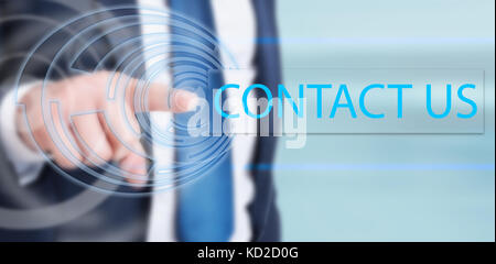 Businessman hand touching contact us button on touchscreen interface in closeup view Stock Photo