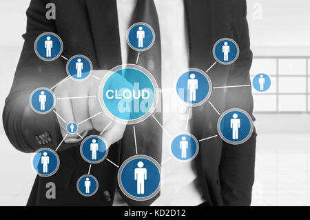 Business man pointing the cloud icon on screen computing and connected world wide application Stock Photo