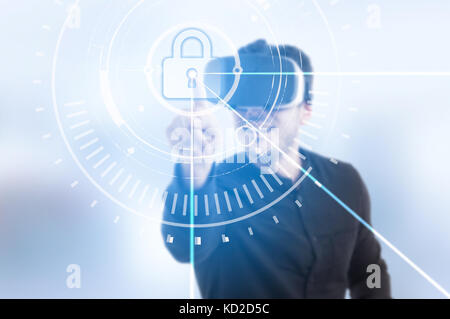 Man touch button locked shield thru virtual reality device for web and database security Stock Photo