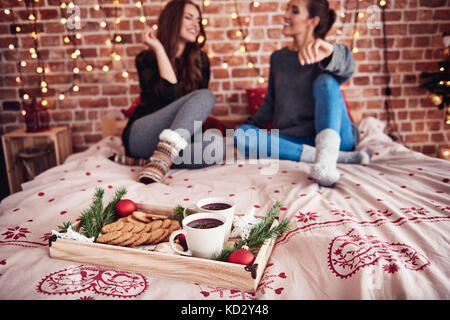 Christmas time with  mulled wine and cookie in bedroom Stock Photo