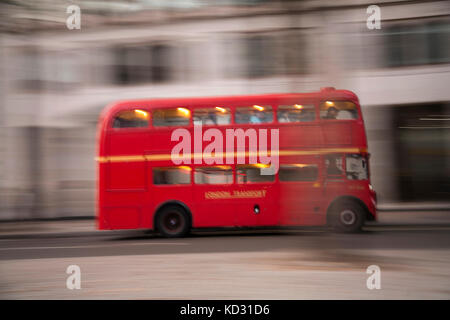 Red London Bus on the move Stock Photo