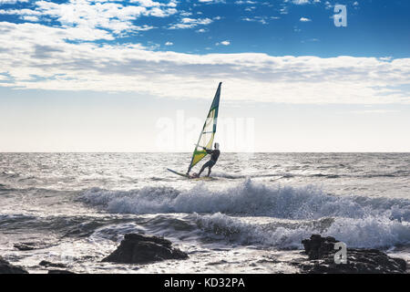 Man windsurfing in sea, Jericoacoara National Park, Ceara, Brazil Stock Photo