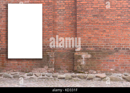 Mock up. Vertical blank billboard, advertising, public information board on old red brick wall. Stock Photo
