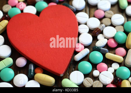 Multicolored tablets of different shapes and sizes Stock Photo