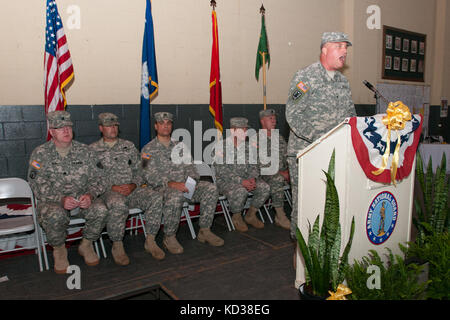 U.S. Army Soldiers with the 132nd Military Police Company, South Carolina Army National Guard, welcome home coming ceremony in the West Columbia Army National Guard Armory, S.C., June 4, 2013. The 132nd MP Company returns home after a nine-month deployment to Kosovo. The 132nd MP Company assisted in maintaining a safe and secure environment as part of Kosovo Force (KFOR) 16. (U.S. Air National Guard photo by Staff Sgt. Jorge Intriago/Released) Stock Photo