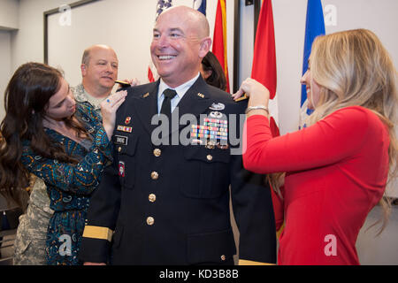 U.S. Army Col. Stephen B. Owens was promoted to brigadier general during a ceremony at The Adjutant General’s Office in Columbia, S.C., Dec. 6, 2015.  Owens currently serves as director of Joint Staff, overseeing and directing the administration of all South Carolina National Guard Joint Staff programs supporting South Carolina domestic response and homeland defense contingency operations. (U.S. Army National Guard photo by Sgt. Brian Calhoun, 108th Public Affairs/Released)  Stock Photo