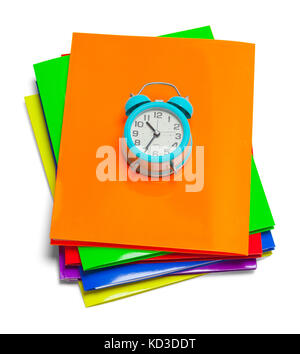 File Folders Stacked with Alarm Clock Isolated on White Background. Stock Photo