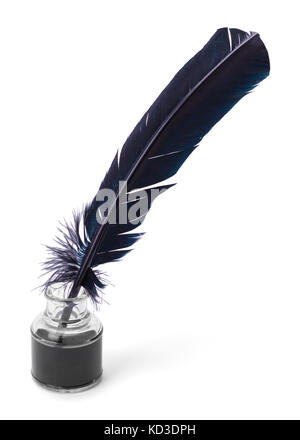 Black Feather Quill in a Glass Ink Jar Isolated on a White Background. Stock Photo