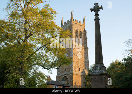 St George's Church in the early morning autumn sunlight. Lower Brailes, Warwickshire, UK Stock Photo