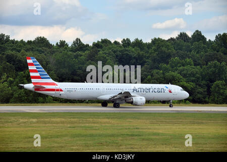 CHARLOTTE - JUNE12: American Airlines Airbus A321 jet departs from Charlotte, NC on June 12, 2015. American has added a number of new 321 jets for coa Stock Photo