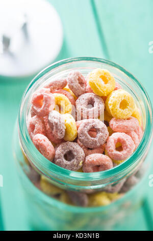 Colorful cereal rings in jar. Stock Photo