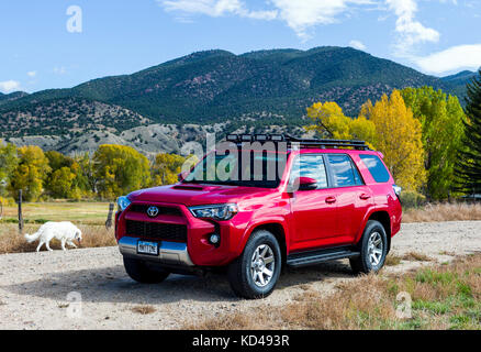 Red 2014 Toyota 4Runner Trail Premium on four wheel drive 4WD road, Central Colorado, USA Stock Photo