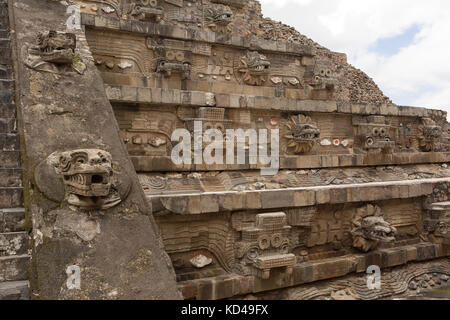pyramid decorated with carved statues at Teotihuacan archaeological site in Mexico Stock Photo