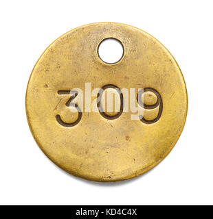 Brass Number Tag Isolated on a White Background. Stock Photo
