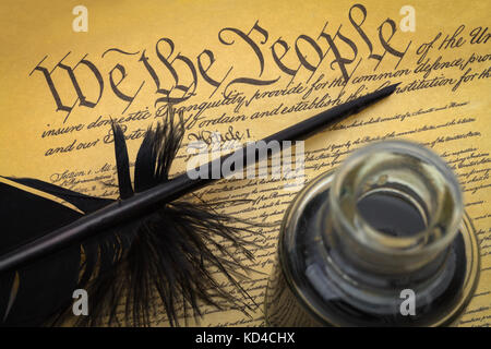 US Constitution with Feather Quill and Ink Well. Stock Photo