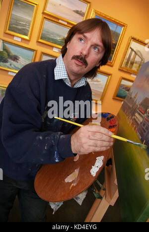 Jack Russell painting at his gallery in Chipping Sodbury Stock Photo