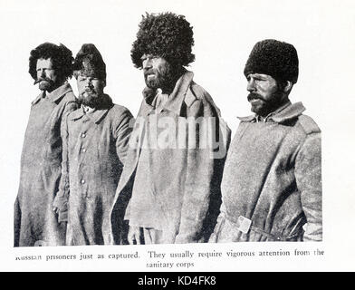 This photo dates to World War I. The caption reads: Russian prisoners just as captured. They usually require vigorous attention from the sanitary corps. Stock Photo