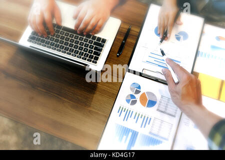 Group of business man and woman discussing on the table about startup business in vintage tone Stock Photo