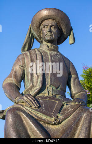 A statue of Infante D. Henrique, also known as Prince Henry the Navigator, located in the historic old town of Lagos, Portugal. Stock Photo