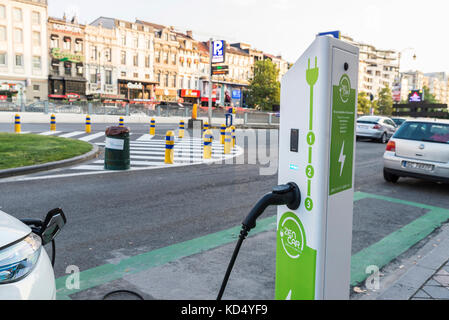 Brussels, Belgium - August 27, 2017: Electric car recharging batteries at a recharge point of the company Zen Car on a street in Brussels, Belgium Stock Photo