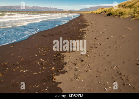 Sandy brown beach in Saudarkrokur town - Iceland. Stock Photo