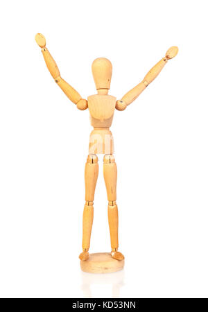 Wooden articulated doll rasing the arms on the white isolated background Stock Photo