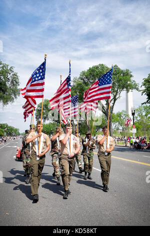 WASHINGTON DC-May 25, 2015: Active duty troops march in the Memorial Day Parade. The Washington monument can be seen in the background. Stock Photo