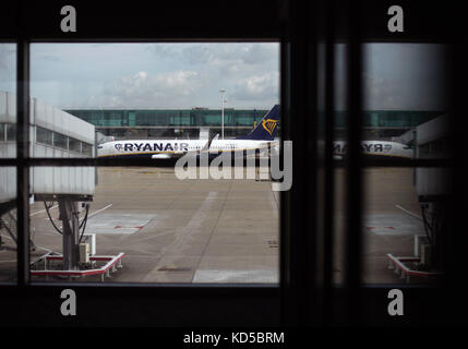 A Ryanair plane on the runway waiting for take off, at London Stansted Airport, in Essex Stock Photo