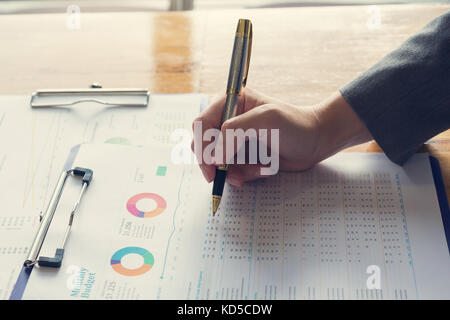 Business and finance concept of office working, Businesswoman discussing analysis chart Stock Photo