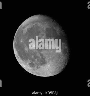 Moon Waning Gibbous 87% phase against black night sky high resolution image Stock Photo