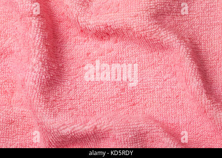 background texture of pink bath towel close-up. view from above Stock Photo